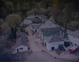 The image shows a bird's eye view of The Glenturret Distillery.